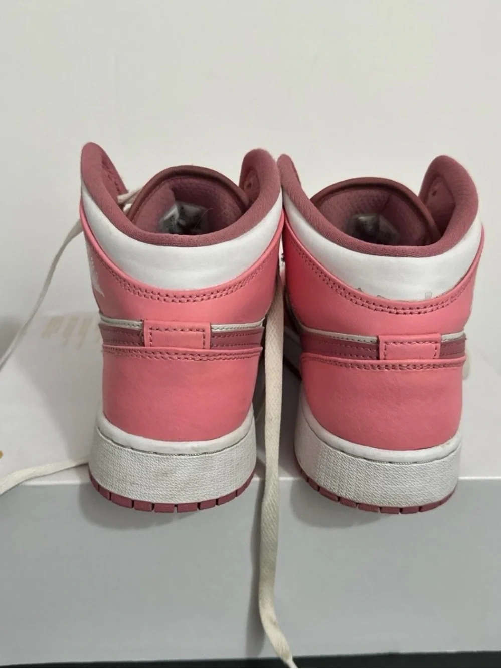 Jordan 1 Kids Pink and White Mid-Top Sneakers with Dark Pink Swoosh